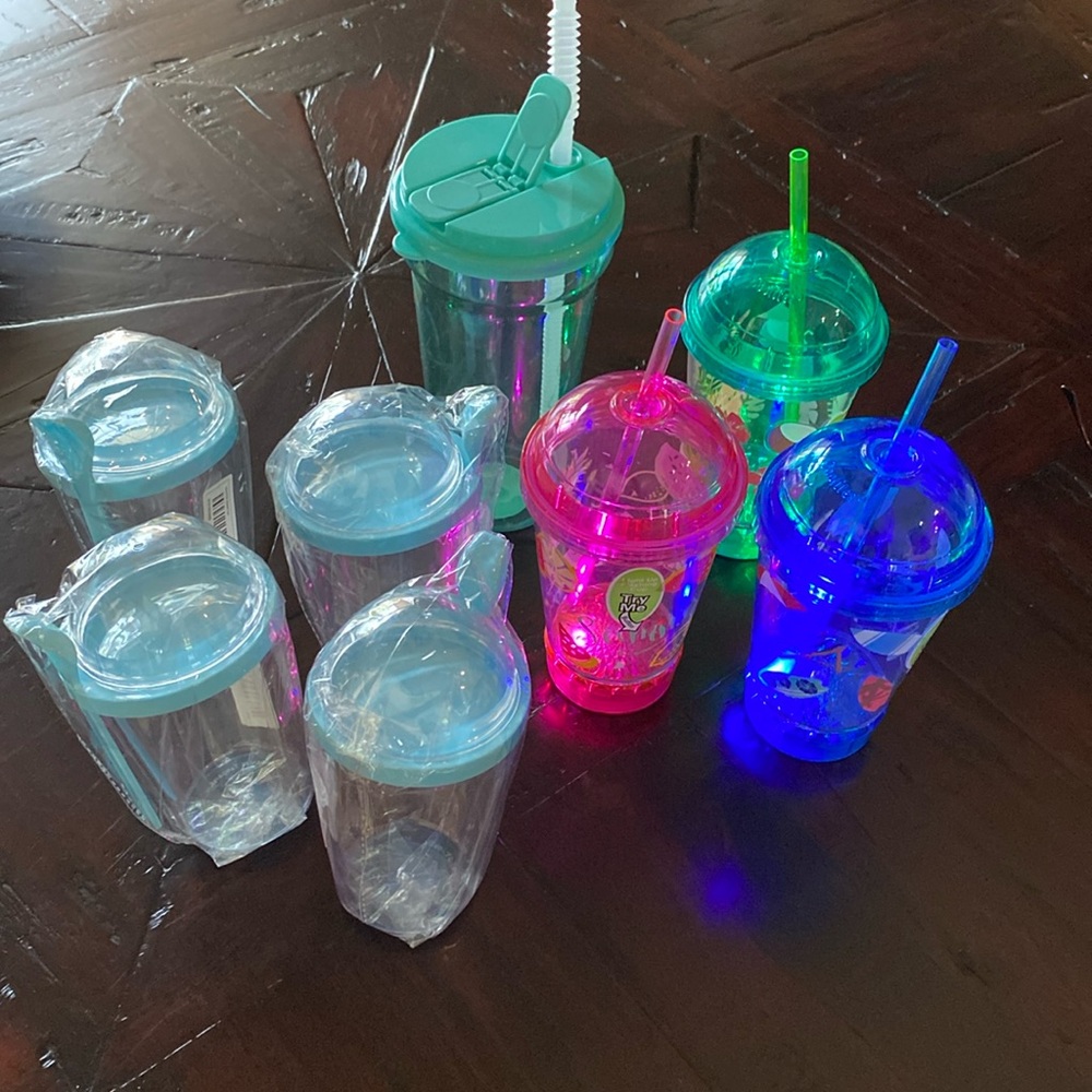 Bundle of fun plastic mugs. New.